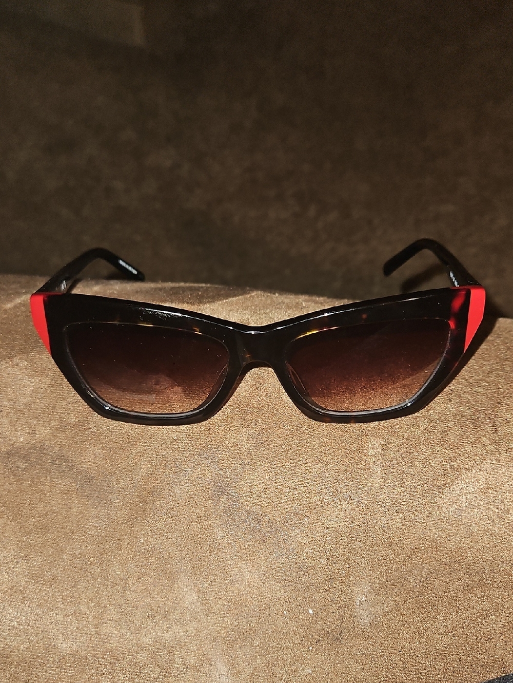 DKNY Cat Eye Sunglasses with Red Temple Accents